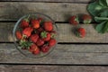 Fresh strawberries on old wooden background. Top view Royalty Free Stock Photo