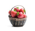Fresh strawberries in small basket isolated on white Royalty Free Stock Photo