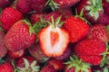 Fresh strawberries, a strawberry berry is cut in half and a red juicy core is visible Royalty Free Stock Photo