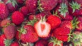 Fresh strawberries, a strawberry berry is cut in half and a red juicy core is visible Royalty Free Stock Photo