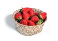 Fresh strawberries in wicker basket isolated from the white background Royalty Free Stock Photo