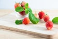 Fresh strawberries on wooden background. selective center focus