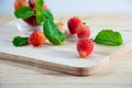 Fresh strawberries on wooden background. selective center focus