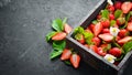 Fresh strawberries in a wooden box. Berries Royalty Free Stock Photo