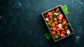 Fresh strawberries in a wooden box. Berries Royalty Free Stock Photo