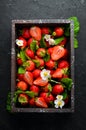 Fresh strawberries in a wooden box. Berries Royalty Free Stock Photo