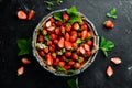 Fresh strawberries in a wooden box. Berries Top view. Royalty Free Stock Photo