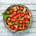 Fresh strawberries in a wooden box. Berries Top view. Royalty Free Stock Photo