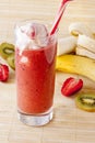 Fresh strawberry-banana smoothie with the addition of kiwi in a glass Royalty Free Stock Photo