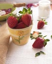 Fresh strawberry berries in a decorative pail