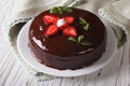 Fresh strawberry cake with chocolate topping horizontal close-up Royalty Free Stock Photo