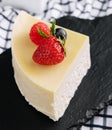 Fresh strawberry cheesecake on black tray Royalty Free Stock Photo