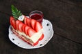 fresh strawberry cheesecake with sauce on white plate Royalty Free Stock Photo