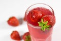 Fresh strawberry cocktail. Fresh fruit summer lemonade with strawberries and ice cubes Royalty Free Stock Photo