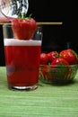 Fresh strawberry drink, radler fruit beer with white foam head Royalty Free Stock Photo