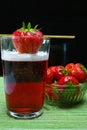 Fresh strawberry drink, radler fruit beer with white foam head Royalty Free Stock Photo