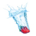 Fresh Strawberry Dropped into Water with Splash Royalty Free Stock Photo