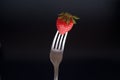 Fresh strawberry on fork Royalty Free Stock Photo