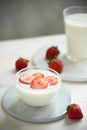 Fresh strawberry on a glass with dessert yogurt and strawberry  on white background Royalty Free Stock Photo