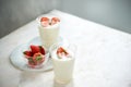 Fresh strawberry on a glass with dessert yogurt and strawberry  on white background Royalty Free Stock Photo