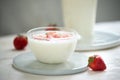 Fresh strawberry on a glass with dessert yogurt and strawberry  on white background Royalty Free Stock Photo