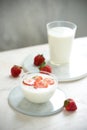 Fresh strawberry on a glass with dessert yogurt and strawberry  on white background Royalty Free Stock Photo