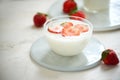 Fresh strawberry on a glass with dessert yogurt and strawberry  on white background Royalty Free Stock Photo