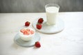 Fresh strawberry on a glass with dessert yogurt and strawberry  on white background Royalty Free Stock Photo