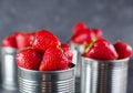 Fresh strawberry on gray background . Dessert with strawberries. Strawberries in the iron pot