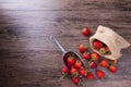 Fresh strawberry in metal ladle on wood table, top view image Royalty Free Stock Photo