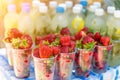 Fresh strawberry and mojito or lemonade with mint, selective focus. Summer time beach food and drink Royalty Free Stock Photo