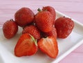 Fresh strawberry on a pink wooden background Royalty Free Stock Photo