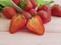 Fresh strawberry on a pink wooden background harvest Royalty Free Stock Photo