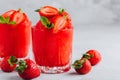 Fresh strawberry rhubarb and watermelon granita with mint on gray stone background Royalty Free Stock Photo