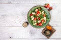 Fresh strawberry salad with arugula, chicken, avocado and strawberries. Plate with a keto diet food. Top view Royalty Free Stock Photo