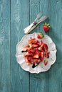 Fresh strawberry salad with red balsamic vinaigrette dressing. Royalty Free Stock Photo