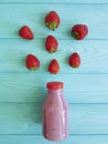 Fresh strawberry smoothies yogurt nutrition on a blue wooden background Royalty Free Stock Photo