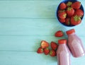 fresh strawberry smoothies yogurt on a blue wooden background Royalty Free Stock Photo