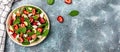 Fresh strawberry spinach salad with feta cheese, nuts and feta cheese, balsamic vinegar. Delicious balanced food concept. banner, Royalty Free Stock Photo