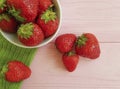 Fresh strawberry on a pink wooden background summer harvest Royalty Free Stock Photo