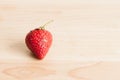 Fresh strawberry on wood.