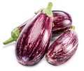 Fresh striped aubergines or eggplants with leaf and slices isolated on white background