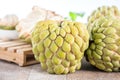 Fresh sugar apple fruitCustard Apple,sweetsop on wooden table