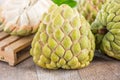 Fresh sugar apple fruitCustard Apple,sweetsop on wooden table