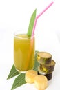 Fresh sugar cane juice in glass on white background Royalty Free Stock Photo