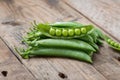 Fresh sugar snap peas on wood background. Royalty Free Stock Photo