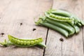 Fresh sugar snap peas on wooden background. Royalty Free Stock Photo