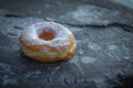 Fresh Sugared Donut on a Rustic Surface