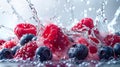 Fresh summer berries and water splash close up. Strawberry, blackberry, black currant, raspberry Royalty Free Stock Photo