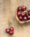 Fresh Summer cherries in wooden bowl Royalty Free Stock Photo